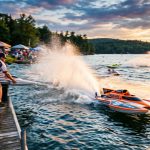 High-speed RC hydroplane boat race with Enforcer branding